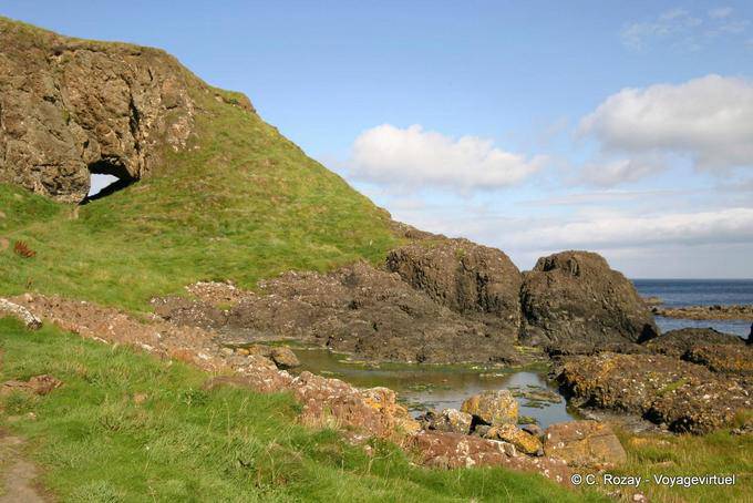 The hole in the cliff, near Port Braddan, White Park Bay - Nothern Ireland