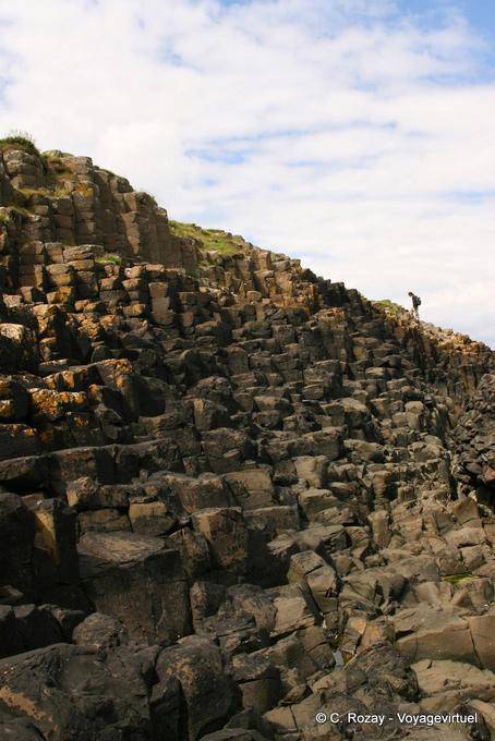 Climb on the basaltic steps, Giants Causeway - Nothern Ireland