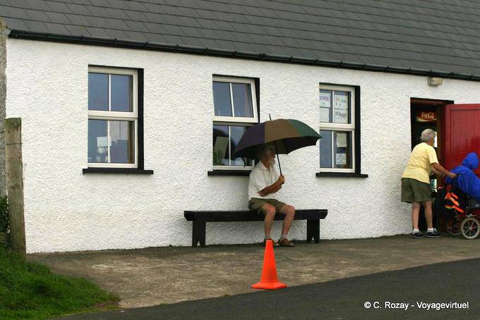 Under the umbrella at the entrance of the pub, Castlerock - Nothern Ireland