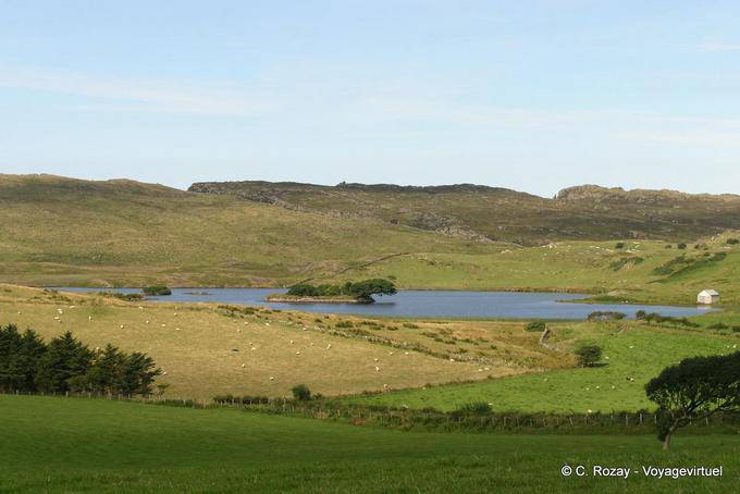 Crannóg in the middle of Lough na Cranagh, Fair Head - Nothern Ireland