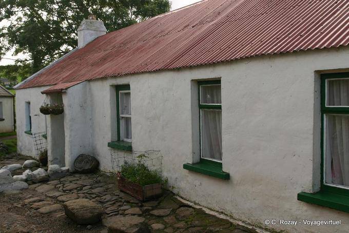 Typical low house with tin roof, near Fairhead - Nothern Ireland