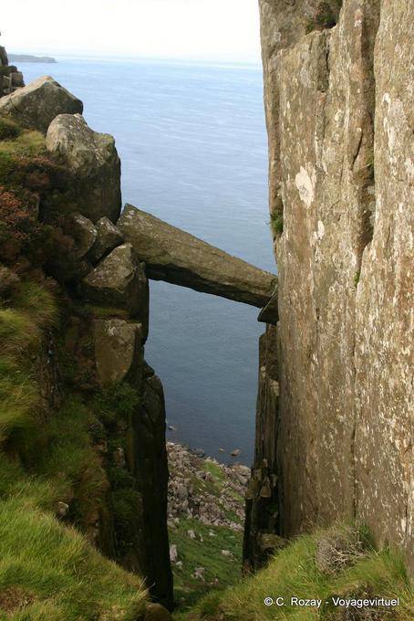 Balance broken column in the crack of the rock, Fairhead - Nothern Ireland