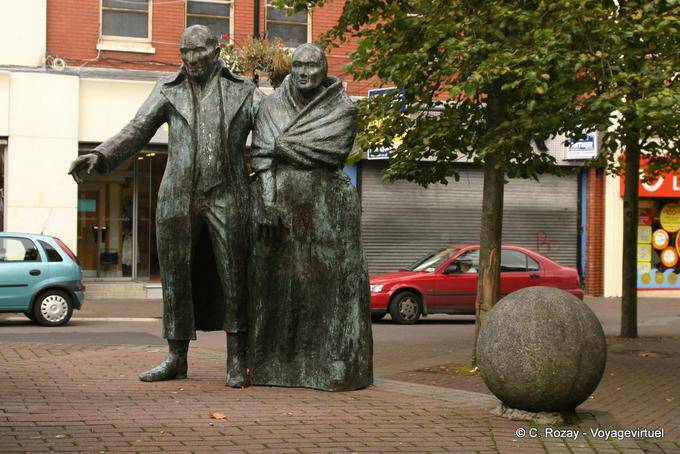 The Emigrants by Eamonn O'Doherty (1990), Waterloo Place, Derry - Nothern Ireland