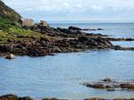 Houses in the rocks on the coast, Layde Road, Antrim, Nothern Ireland.