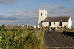 Church steeple in funny to Ballinton Harbour, Antrim Coast, Nothern Ireland.