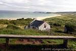 Bench and old house, White Park Bay, Nothern Ireland.