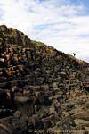 Climb on the basaltic steps, Giants Causeway, Nothern Ireland.