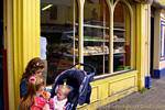 Children in front of a bakery, Dogside, Derry, Nothern Ireland.