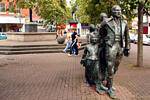 Statues of emigrants leaving Ireland through the port of Derry, Waterloo Place, Derry, Nothern Ireland.
