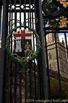 Skeleton coat of arms on the grid of the St Columb's Cathedral, Derry, Nothern Ireland.