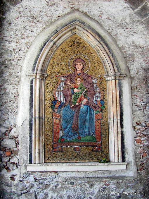 Pious image in the Clock Tower, Taormina - Italy