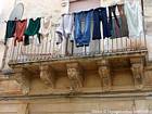 Machine to the balcony, Noto, Italy.
