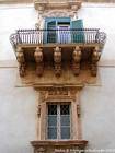 View on a palace balcony Villadorata, Noto, Italy.