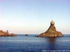 Ilot phallic towards isolates dei Ciclopi, Sicily, Italy.
