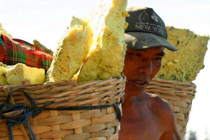 Kawa Ijen, a face between sulfur blocks, Java - Indonesia
