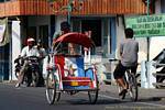 Tuk-tuk used as a taxi, port of Ketapang, Java, Indonesia.