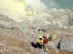 Mid-term holder of the ascent of the crater, Kawah Ijen, Java, Indonesia.