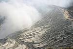 Cloud of acid fumes in the path of lava, Kawa Ijen, Java, Indonesia.
