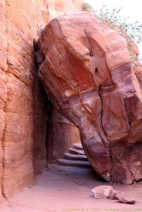 Passage of the stairs under a fallen rock, Petra Deir - Jordan