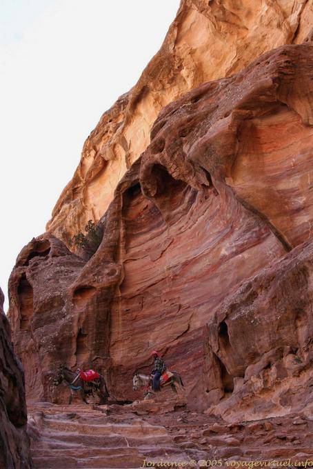 Riders in the steep descent, Petra Deir - Jordan