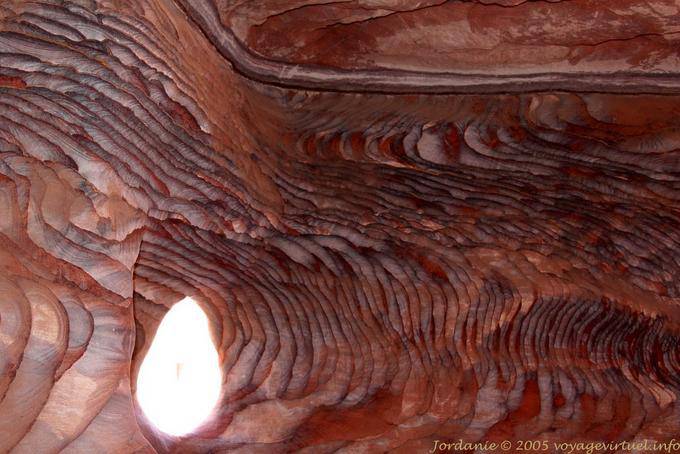A multicolored interior tomb facades street, Petra Khubta - Jordan