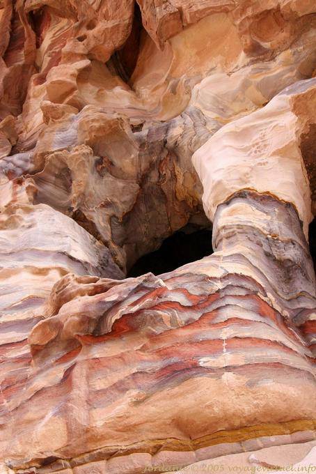 Hole in pink and yellow sandstone, Petra Lower City - Jordan
