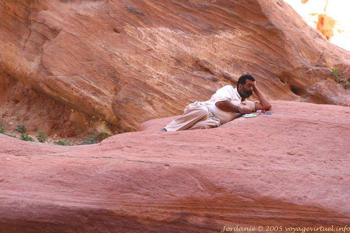 Man sitting in Wadi El Farasah, Petra - Jordan