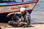 Rest in front of a boat, Aqaba, Jordan.