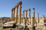 Broken columns and lintels on the Cardo Maximus, Jerash, Jordan.
