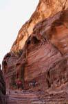 Riders in the steep descent, Petra Deir, Jordan.