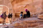 Bedouin, their children and their donkeys amount Deir - Petra, Jordan.