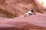 Man sitting in Wadi El Farasah, Petra, Jordan.