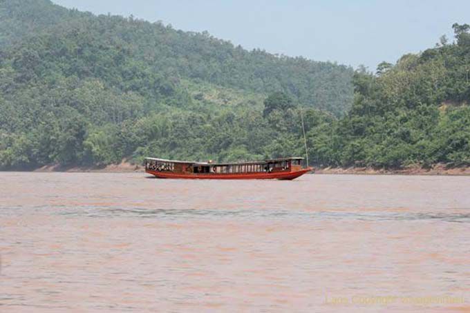 Traditional transport boat on the Mekong, Luang Prabang, Lao