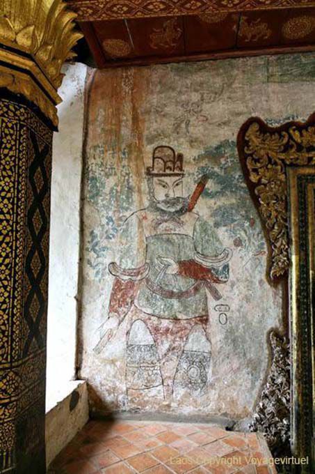 Chinese painting old guard at Wat Long Khun, Lao