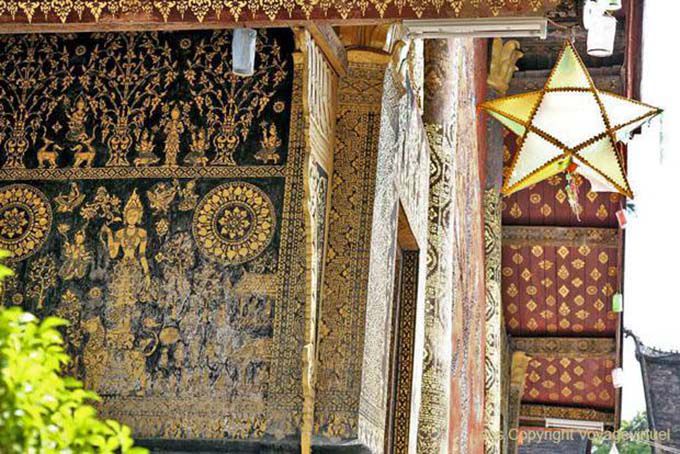 Lion goddess with vines on Sim, Wat Xieng Thong, Lao