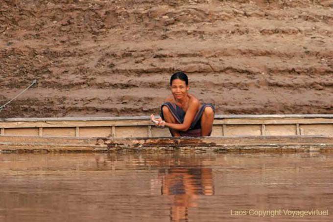 The time of the toilet in the river, Mekong, South Laos, Lao