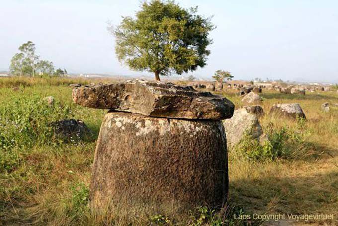 Broken jar with lid, Plain of Jars Xieng Khouang, Lao