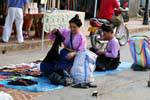 Traditional costume of street vendors, Luang Prabang, Lao.