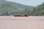 Traditional transport boat on the Mekong, Luang Prabang, Lao.