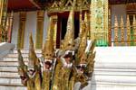 Snake-dragon, entrance to the pagoda Haw Pha Bang, Luang Prabang Palace, Lao.