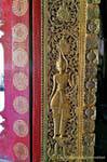 Decorative Detail of a door of the temple, Wat Mai, Luang Prabang, Lao.