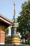 Small painted stupa, Wat Sene Soukharam, Luang Prabang, Lao.