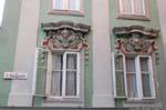 Altstadt, Badgasse, mascaron on the windows, Linz, Austria.