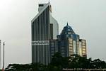 Architectural patchwork of downtown (Menara Maykank and Menara Olympia), Kuala Lumpur, Malaysia.
