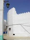 Angle fortified street, street Sidi Tayeb, Medina Asilah, Morocco.