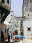 Peddler in an alley in the Kasbah, Larache, Morocco.