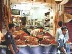 The Merchant of figs and dates in the souk, Fes, Morocco.