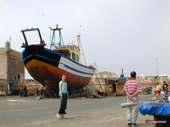 The wooden fishing boat in dry dock on the dock, Essaouira - Morocco