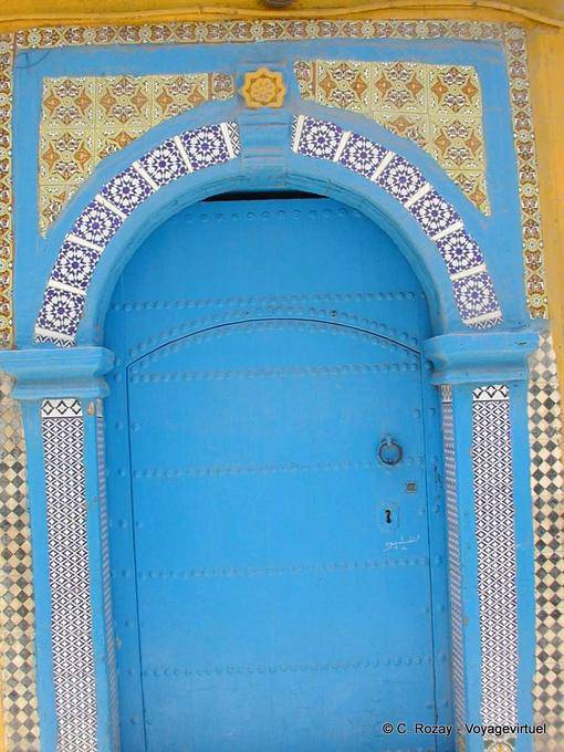 Typical well decorated blue door entrance, Essaouira - Morocco