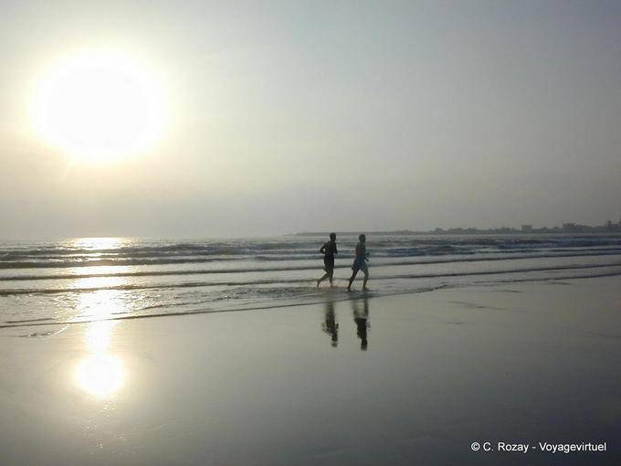 Running on the beach of Essaouira at sunset - Morocco